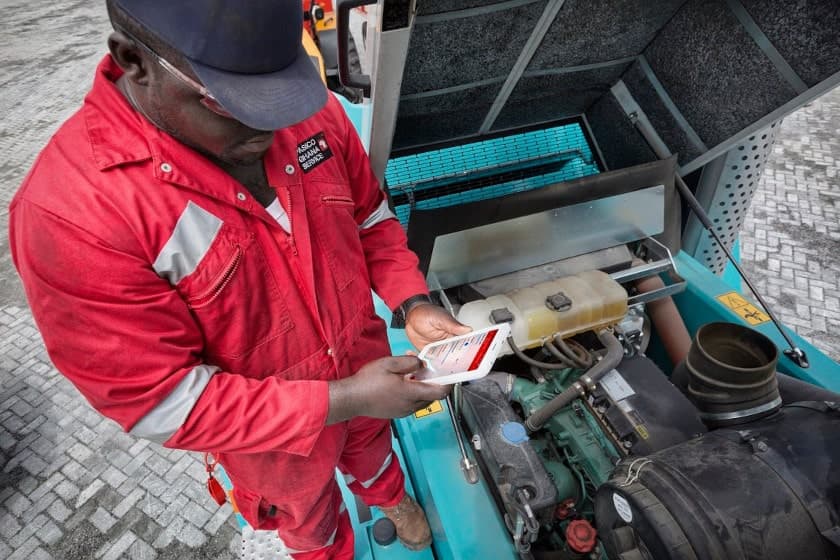 Technician checking instruments