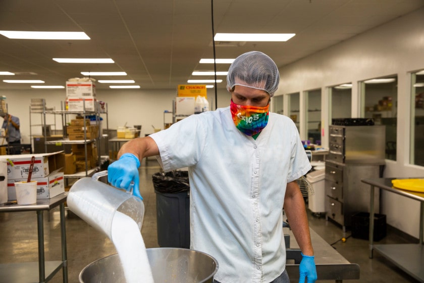FGP Manufacturing employee prepares ingredients for a new batch