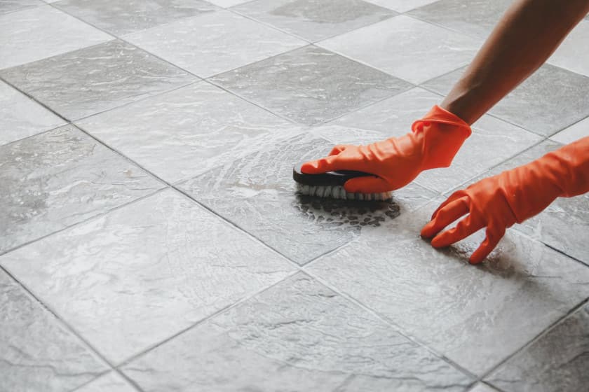 cleaning up floor for post-construction cleaning checklist