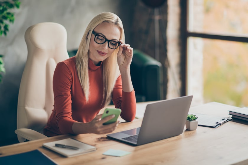 woman completing paperwork remotely while working from home